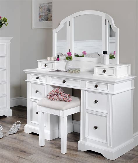 You can also find dressing tables with built in mirrors. . Dressing table with drawers